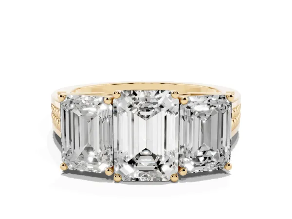 Emerald Cut Diamond Three-Stone Ring with Prong Setting and Textured Band Yellow gold