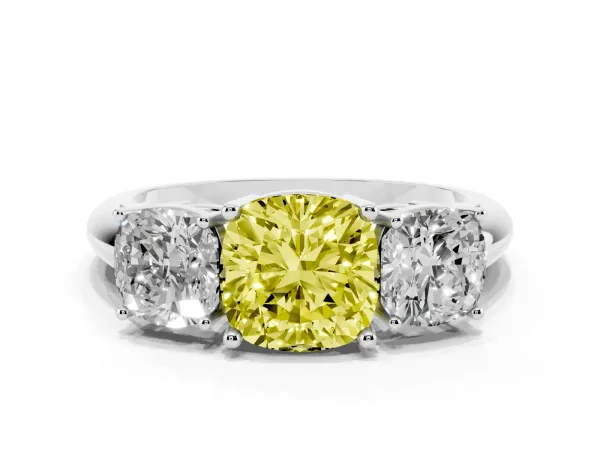 Fancy Yellow Three-Stone Cushion Cut Cut Diamond Engagement Ring with Prong Setting on a White Gold Band Platinum
