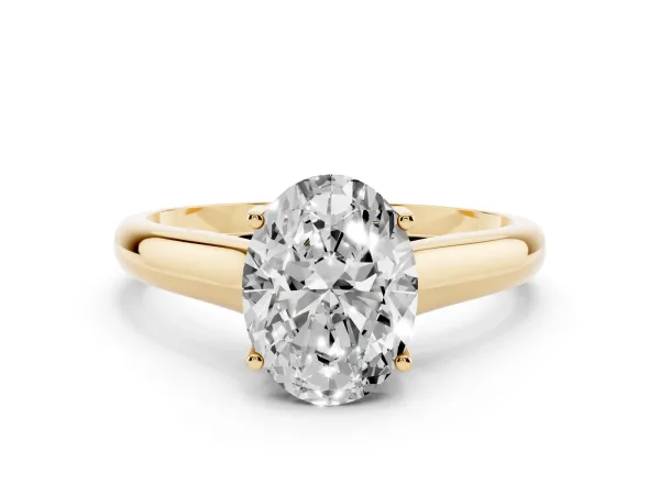 Oval Cut Solitaire Engagement Ring with Tapered Band and Four-Prong Setting Yellow gold