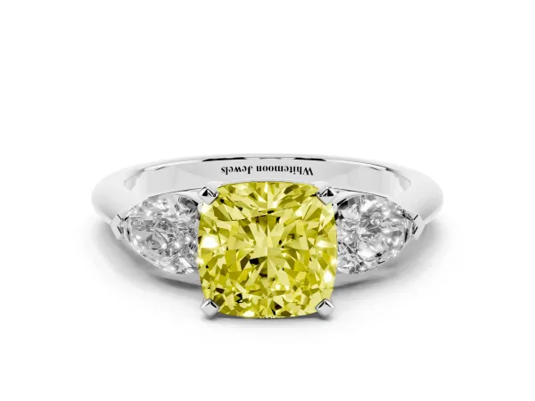 Fancy Yellow Three-Stone Cushion Cut Diamond Ring with Pear Side Stones and Four-Prong Setting Platinum