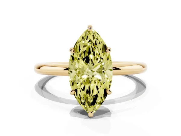 Fancy Yellow Oval Cut Solitaire Diamond Ring with Four-Prong Setting on a Plain Band Yellow gold