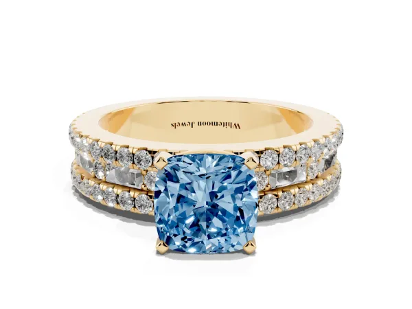 Fancy Blue Cushion Cut Diamond Solitaire Ring with Pavé and Channel Set Band Yellow gold