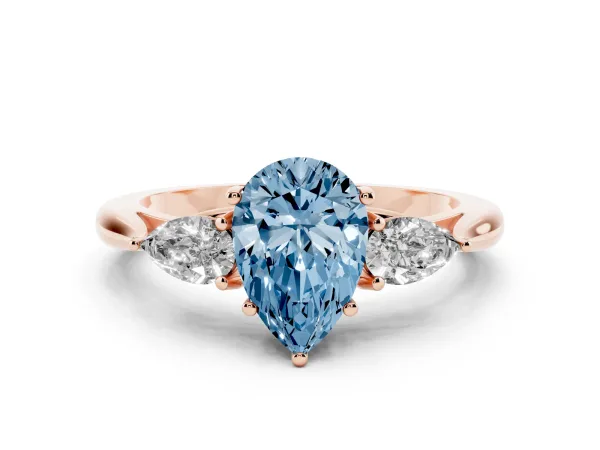 Fancy Blue Three-Stone Pear Cut Diamond Ring with Pear Side Stones in Four-Prong Setting Rose gold
