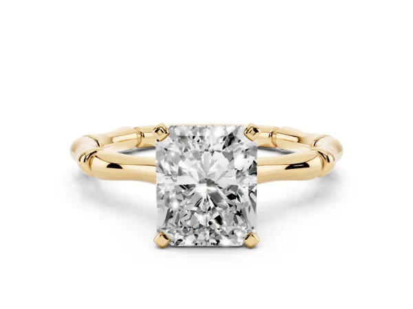 Radiant Cut Solitaire Diamond Ring with Bamboo Band and Four-Prong Setting Yellow gold