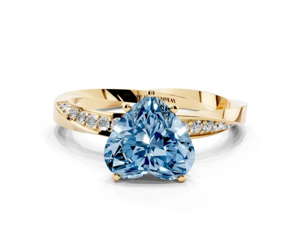 Fancy Blue Heart Cut Diamond Engagement Ring with Side Stone Accents and Four-Prong Setting Yellow gold