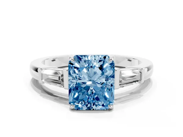 Fancy Blue Radiant Cut Diamond Three-Stone Ring with Tapered Baguette Side Stones and Prong Setting Platinum