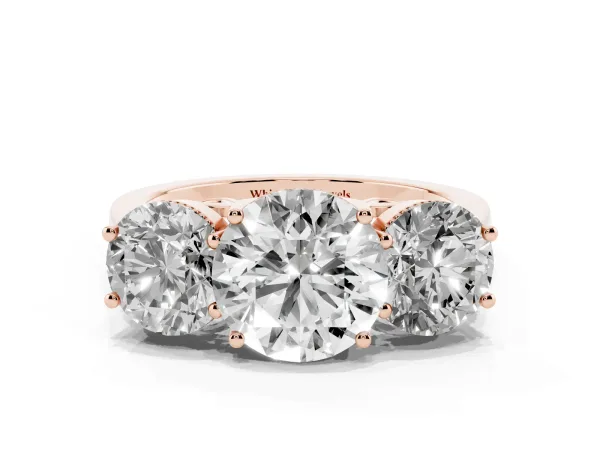 Three-Stone Round Cut Diamond Engagement Ring with Prong Setting on a Classic Band Rose gold