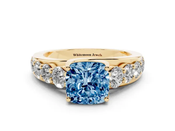 Fancy Blue Cushion Cut Diamond Engagement Ring with Pavé Band and Four-Prong Setting Yellow gold