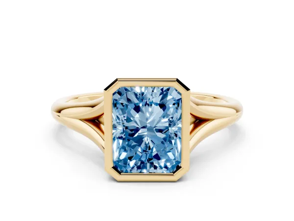 Fancy Blue Bezel Set Radiant Cut Cut Solitaire Ring with Tapered Band Yellow gold