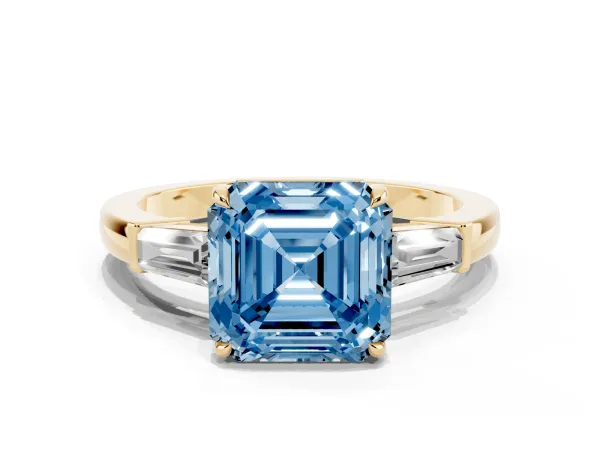 Fancy Blue Asscher Cut Diamond Three-Stone Ring with Tapered Baguette Side Stones and Prong Setting Yellow gold
