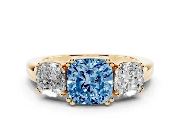 Fancy Blue Three-Stone Cushion Cut Cut Diamond Ring with Channel Set Band and Four-Prong Setting Yellow gold
