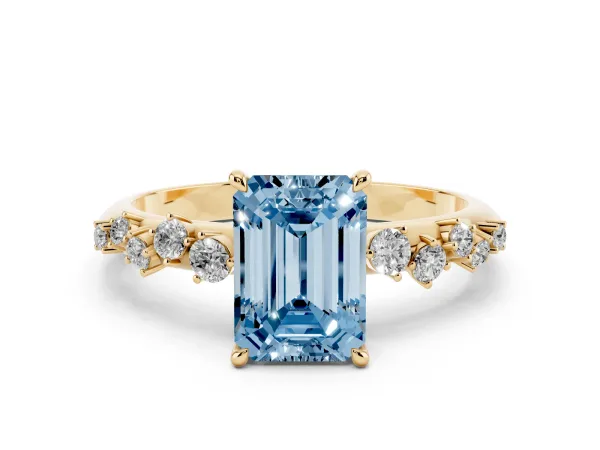 Fancy Blue Emerald Cut Diamond Cluster Side Stone Solitaire Ring with Prong Setting Yellow gold