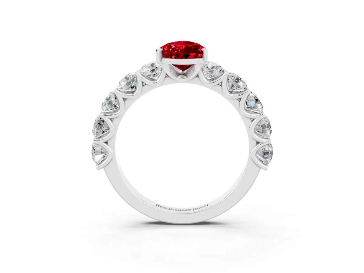 Pear Cut Ruby Prong Setting with Side Stones on a Pave Band Platinum
