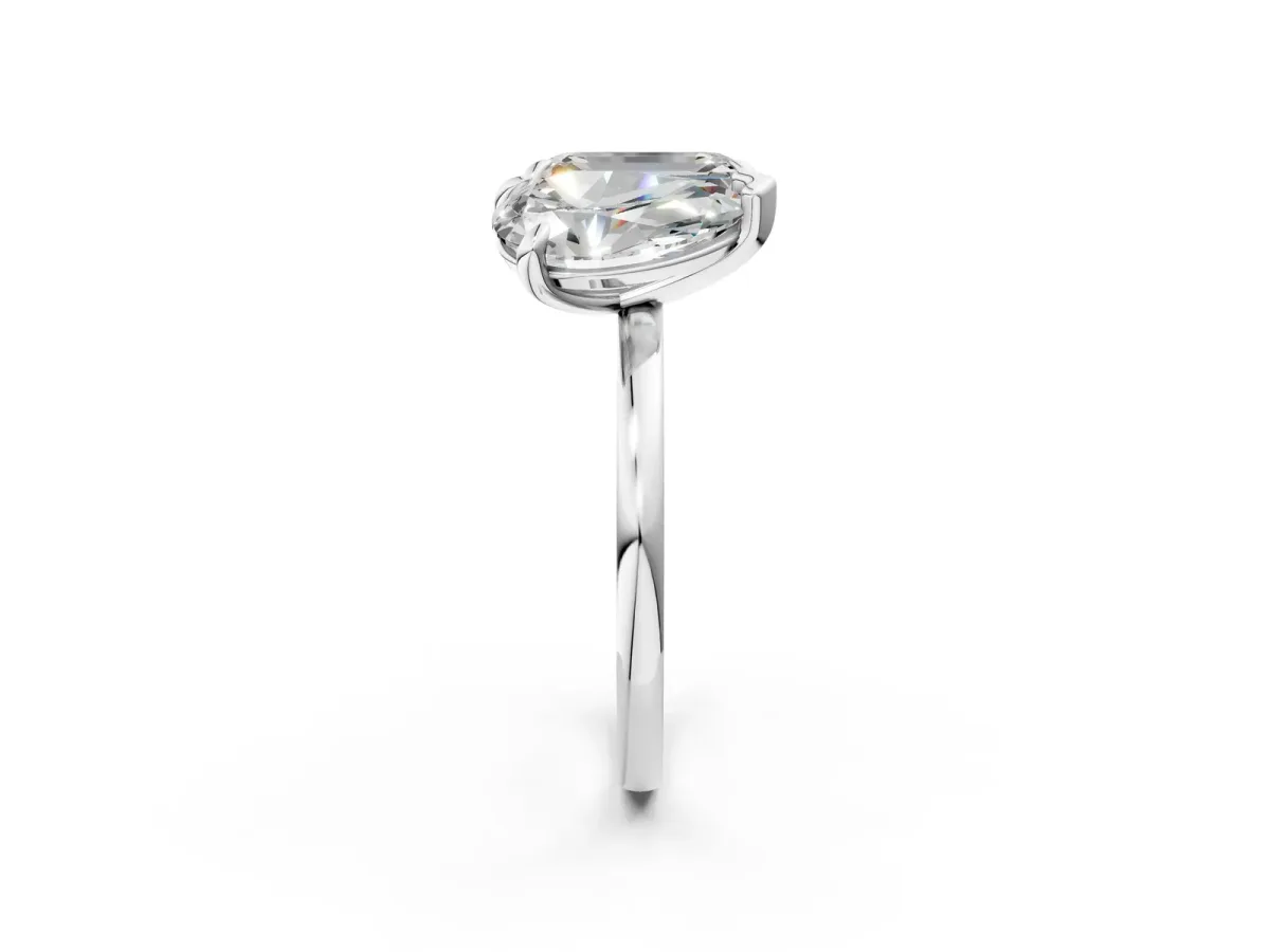 Pear and Emerald Toi Moi Ring with Prong Setting and Plain Band Silver
