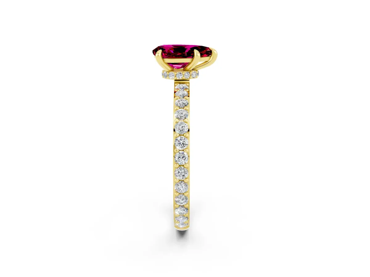 Pear Cut Garnet Solitaire Engagement Ring with Pavé Band and Four-Prong Setting Yellow gold