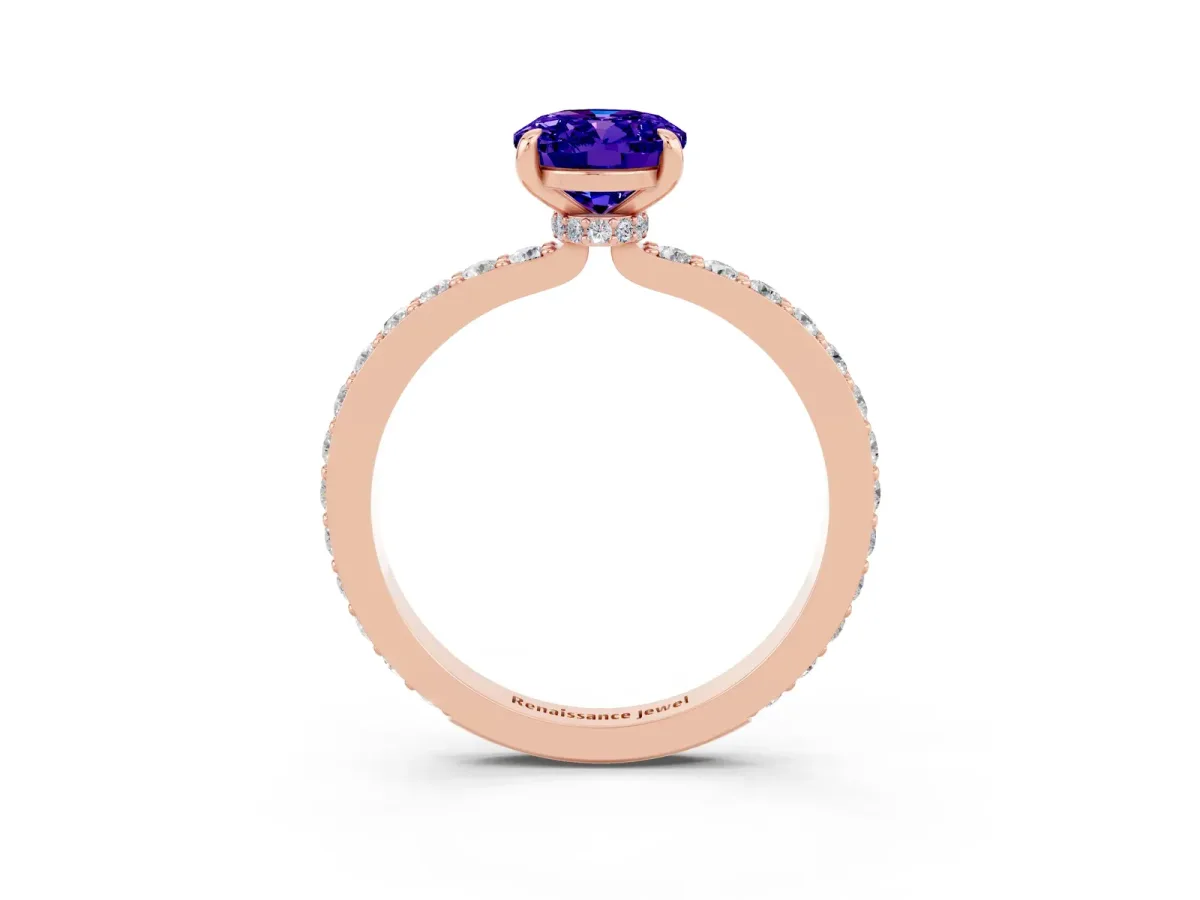 Oval Cut Tanzanite Solitaire Engagement Ring with Pavé Band and Four-Prong Setting Rose gold