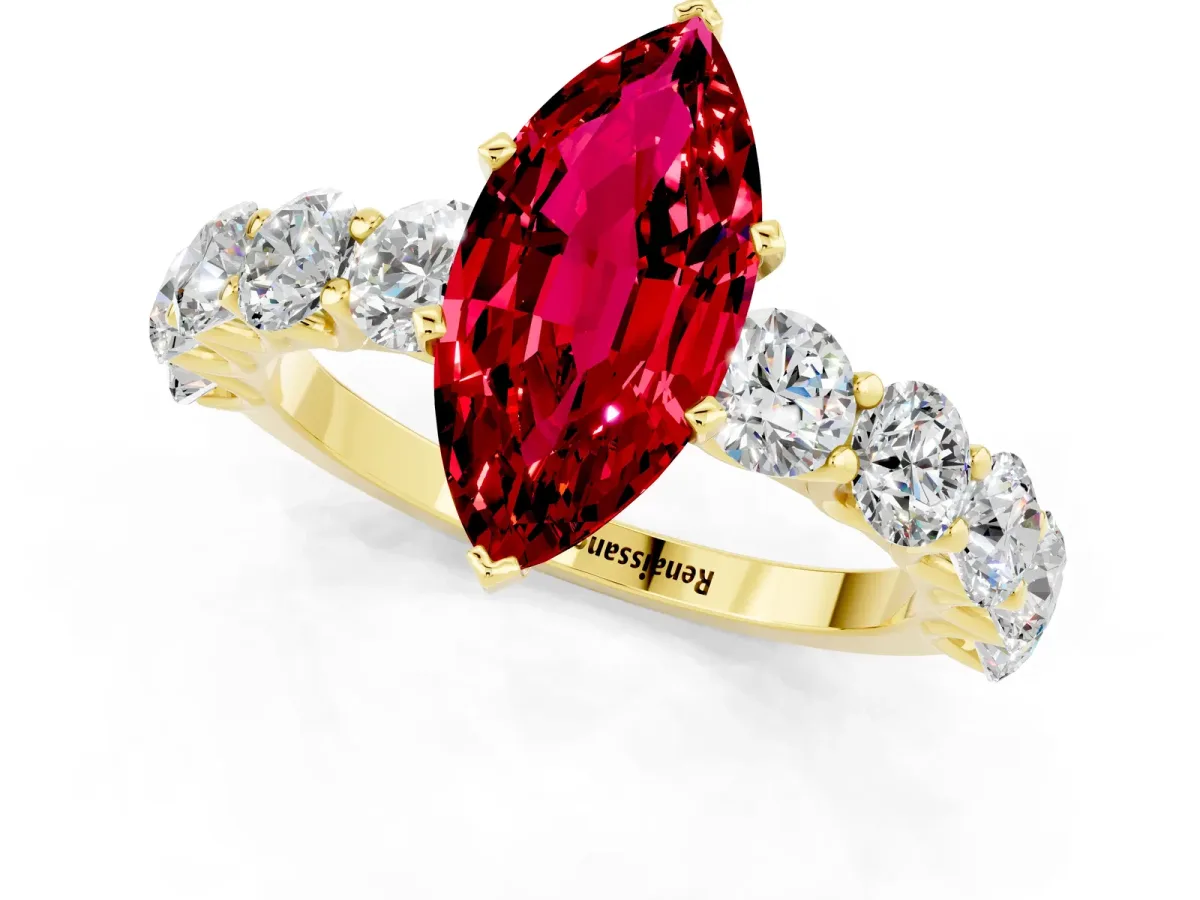 Marquise Cut Ruby Prong Setting with Side Stones on a Pave Band Yellow gold
