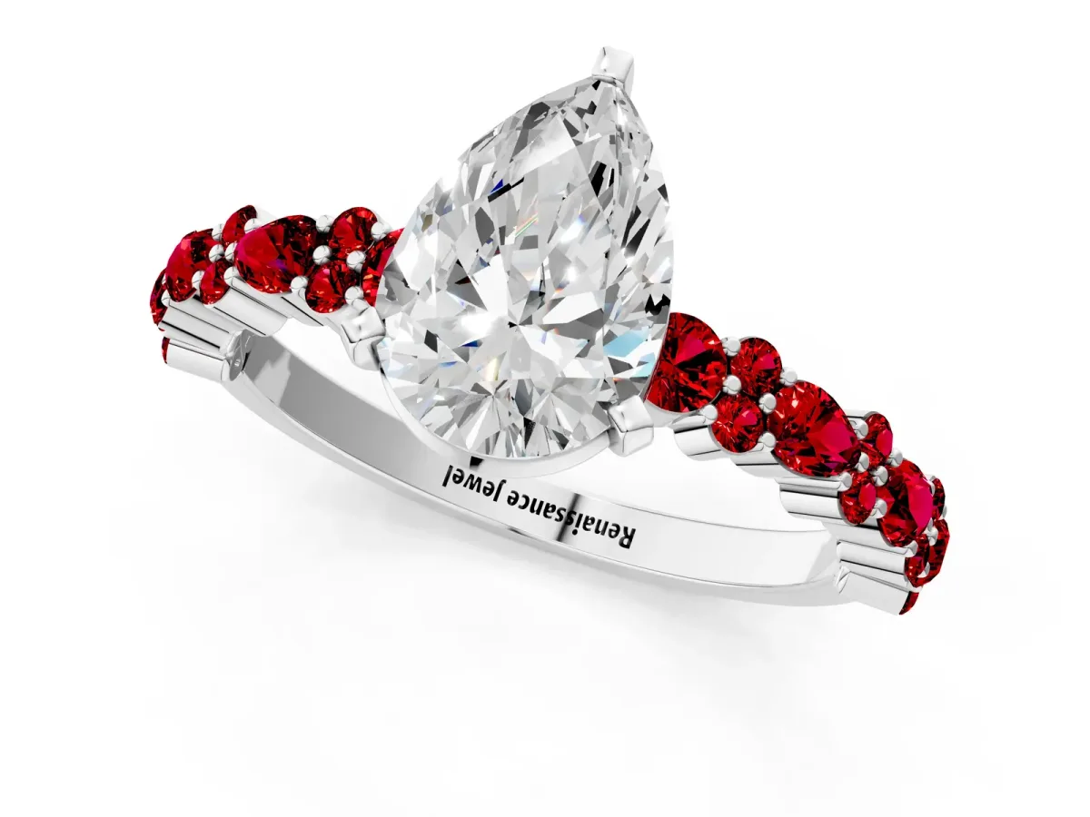 Pear Cut Diamond Side Stone Solitaire Ring with Round Ruby and Four-Prong Setting Silver
