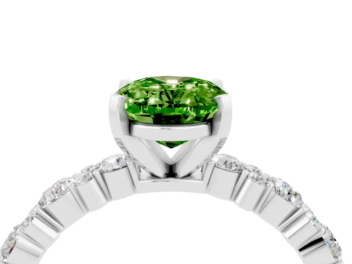 Oval Cut Peridot Side Stone Solitaire Ring with Round and Four-Prong Setting Platinum