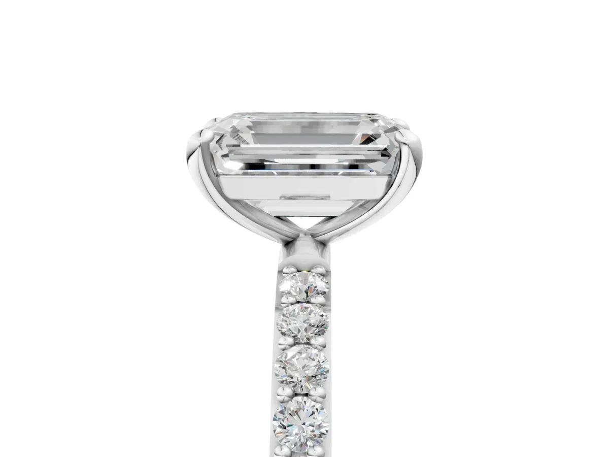Emerald Cut Diamond Solitaire Ring with Round Pavé Band and Prong Setting Platinum