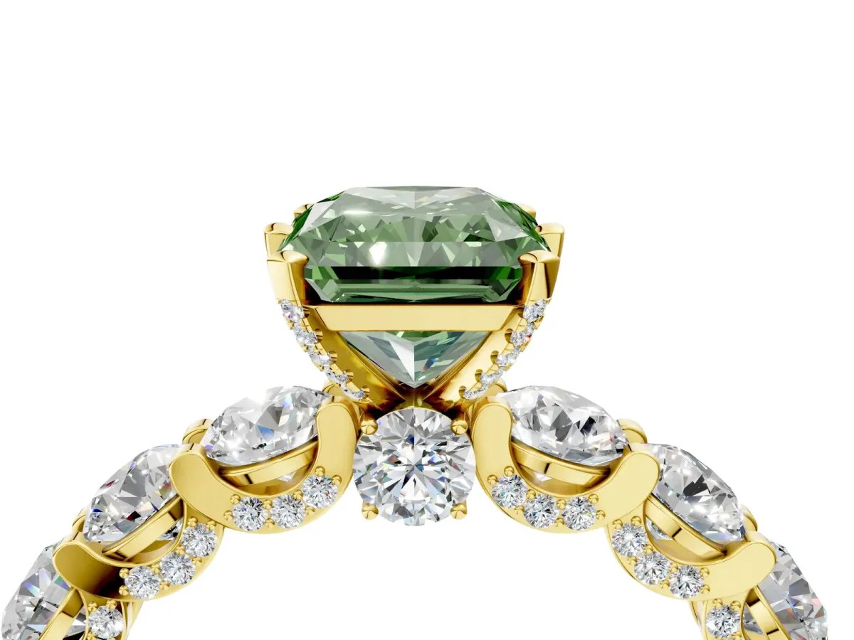 Fancy Green Radiant Cut Diamond Side Stone Engagement Ring with Four-Prong Setting Yellow gold