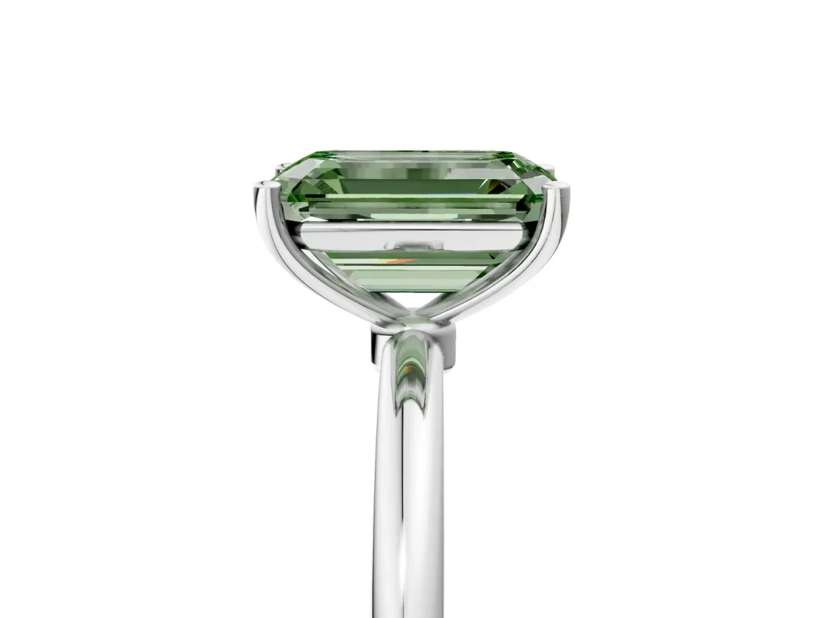 Fancy Green Emerald Cut Cut Solitaire Engagement Ring with Thin Band and Four-Prong Setting Silver