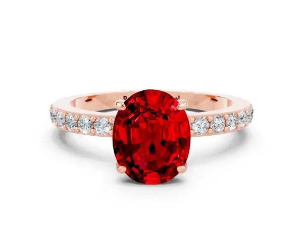 Oval Cut Ruby Solitaire Engagement Ring with Pavé Band and Four-Prong Setting Rose gold