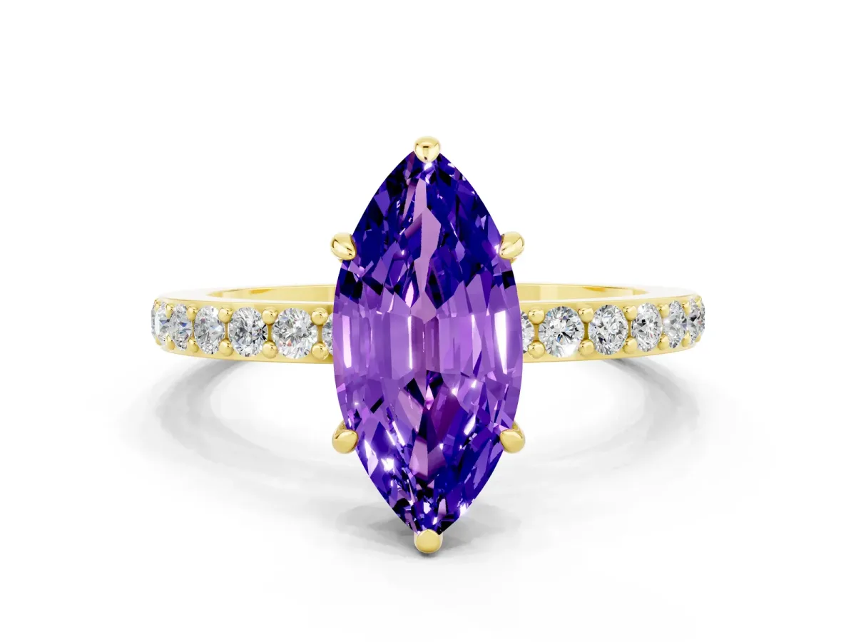 Marquise Cut Tanzanite Solitaire Engagement Ring with Pavé Band and Four-Prong Setting Yellow gold