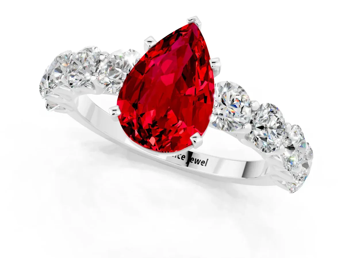 Pear Cut Ruby Prong Setting with Side Stones on a Pave Band Platinum