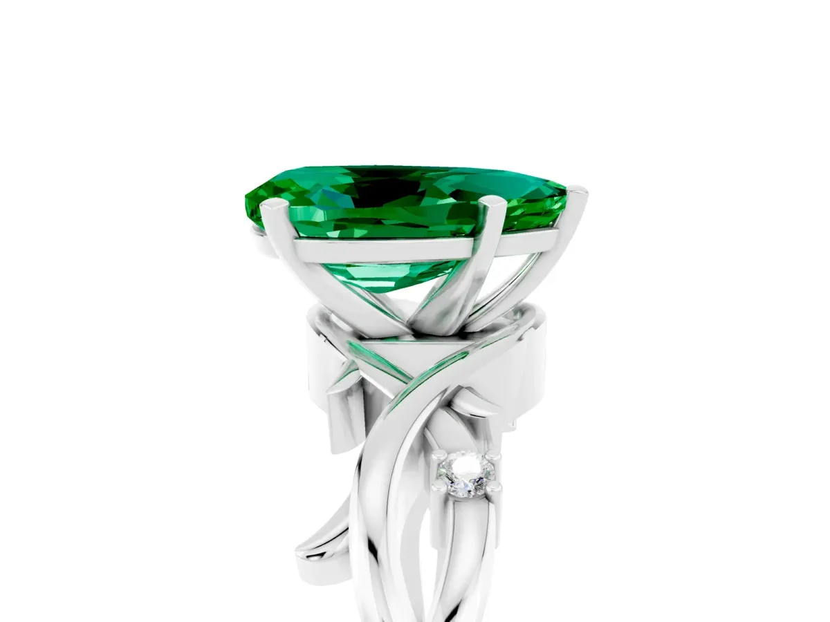 Pear Cut Emerald Solitaire Ring with Twisted Band and Prong Setting Platinum