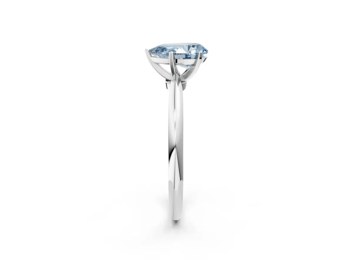 Fancy Blue Pear Cut Diamond Solitaire Ring with Six-Prong Setting and Classic Band Silver