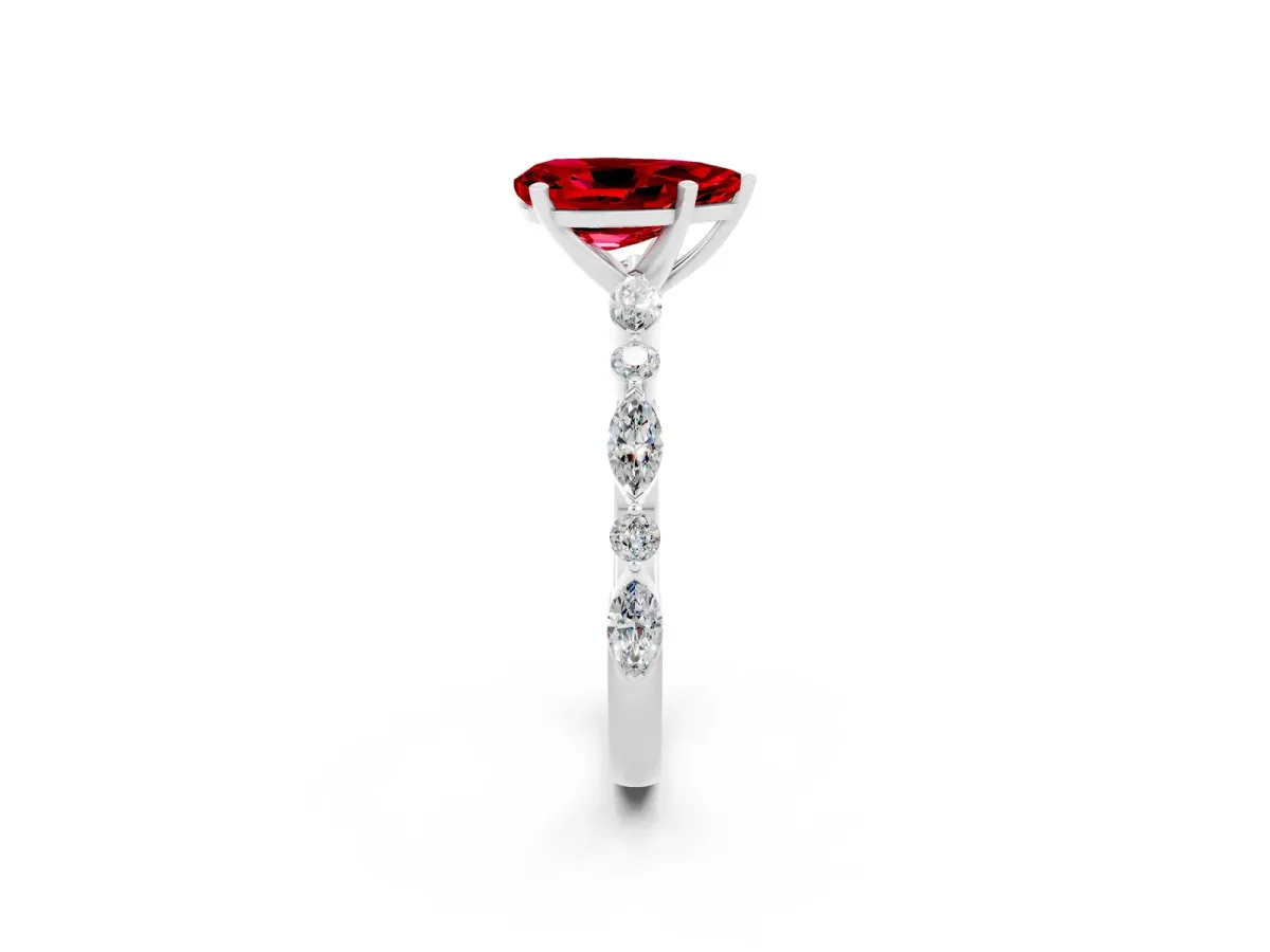 Pear Cut Ruby Ring with Marquise and Round Side Stones and Four-Prong Setting Platinum