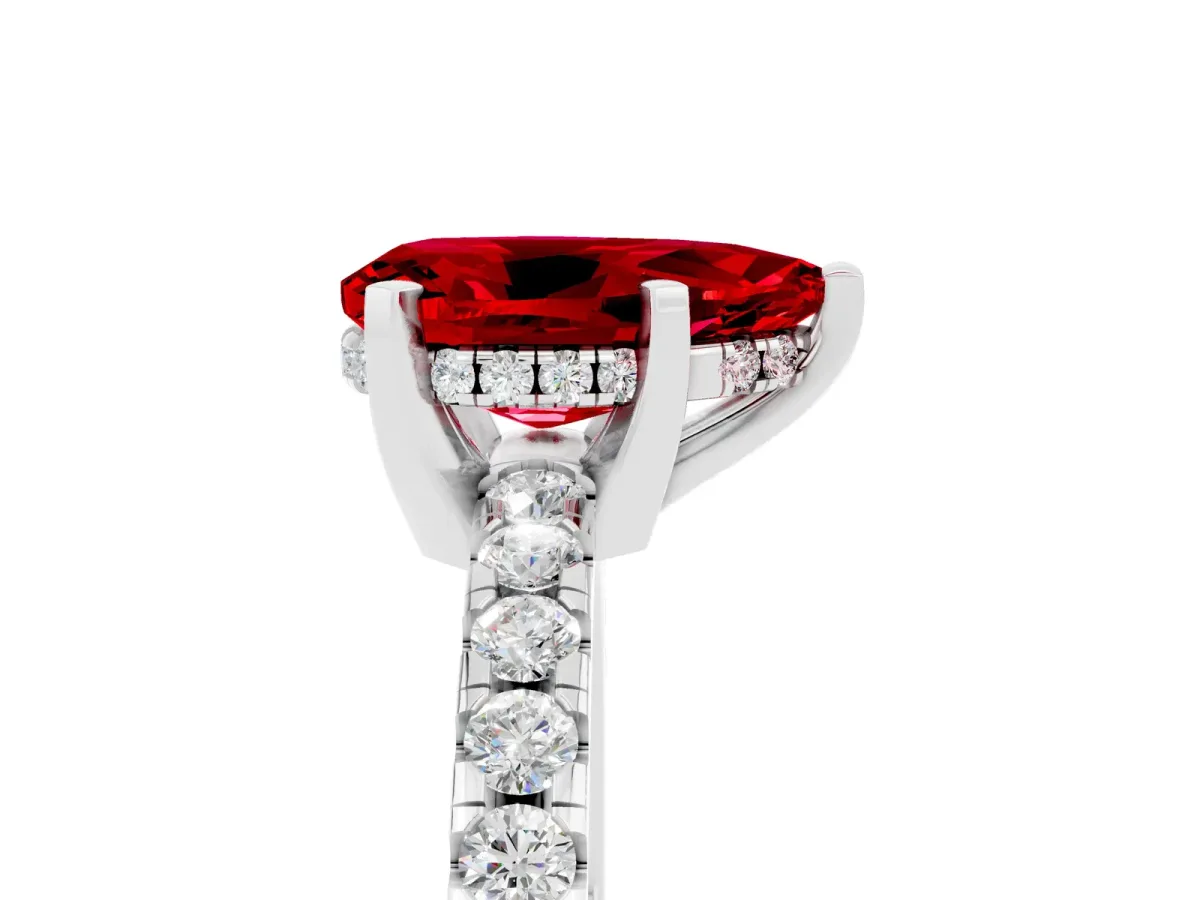 Pear Cut Ruby Solitaire Ring with Round Pavé Band and Four-Prong Setting White gold
