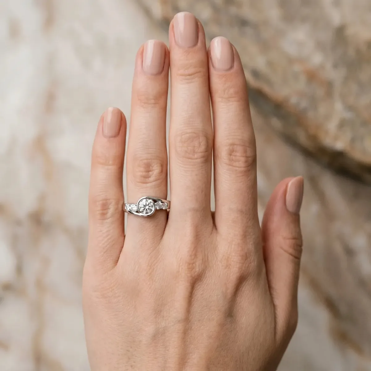 Bezel Set Round Cut Diamond Bypass Ring with Round Accents Platinum