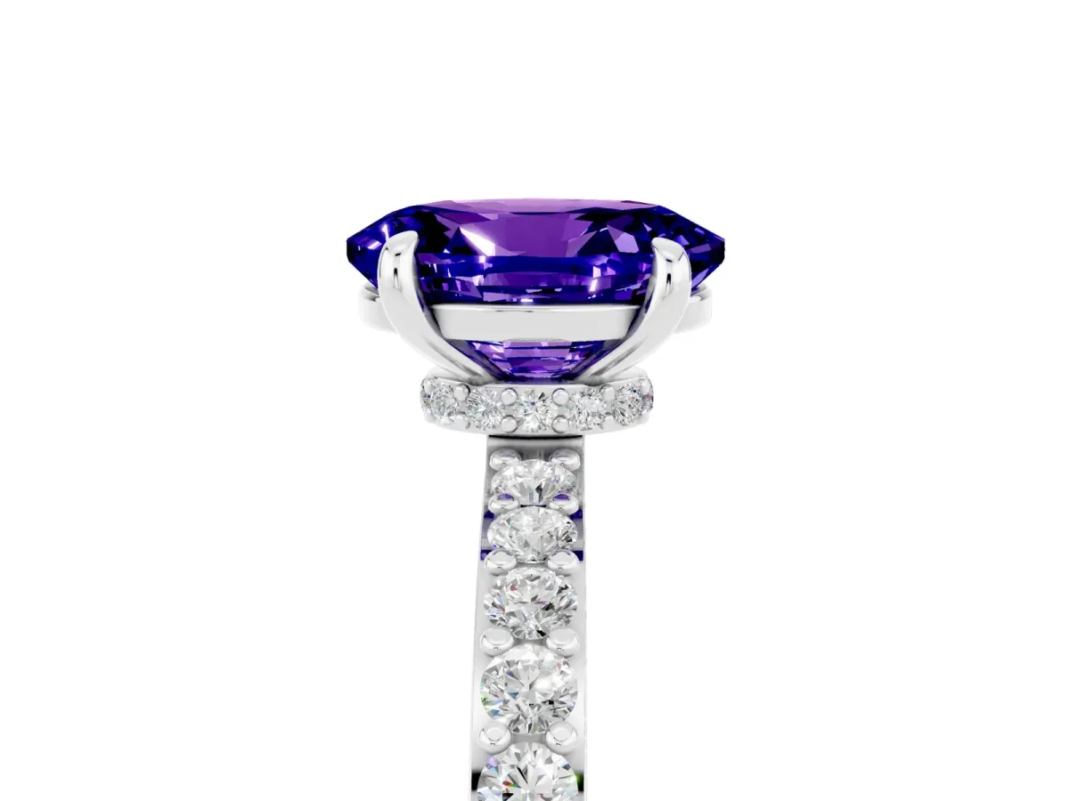 Oval Cut Tanzanite Solitaire Engagement Ring with Pavé Band and Four-Prong Setting Platinum