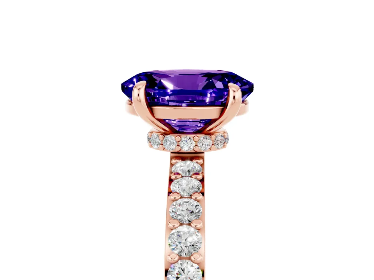 Oval Cut Tanzanite Solitaire Engagement Ring with Pavé Band and Four-Prong Setting Rose gold