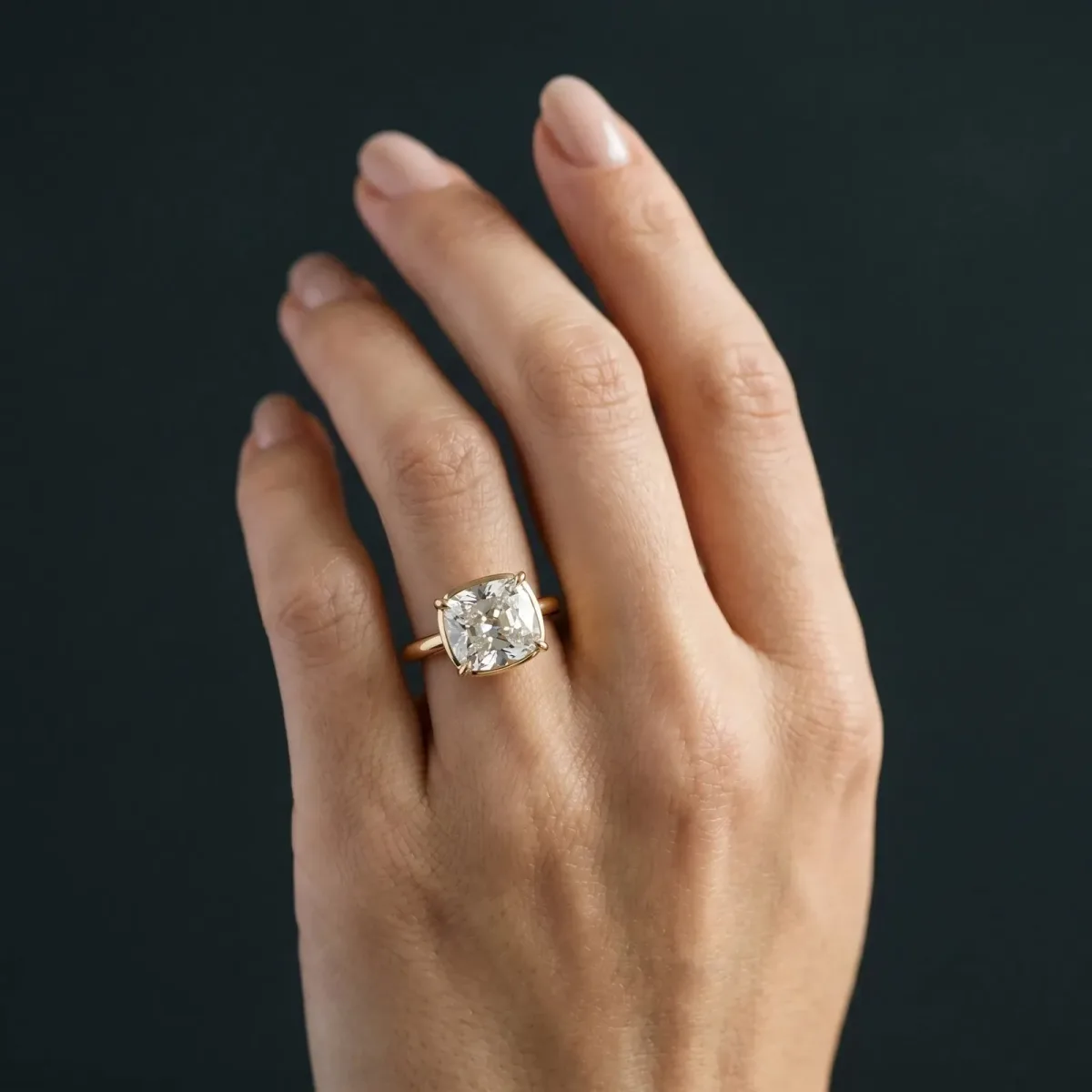 Old Mine Elongated Cushion Diamond East-West Bezel Set Four Claw Solitaire Ring Yellow gold