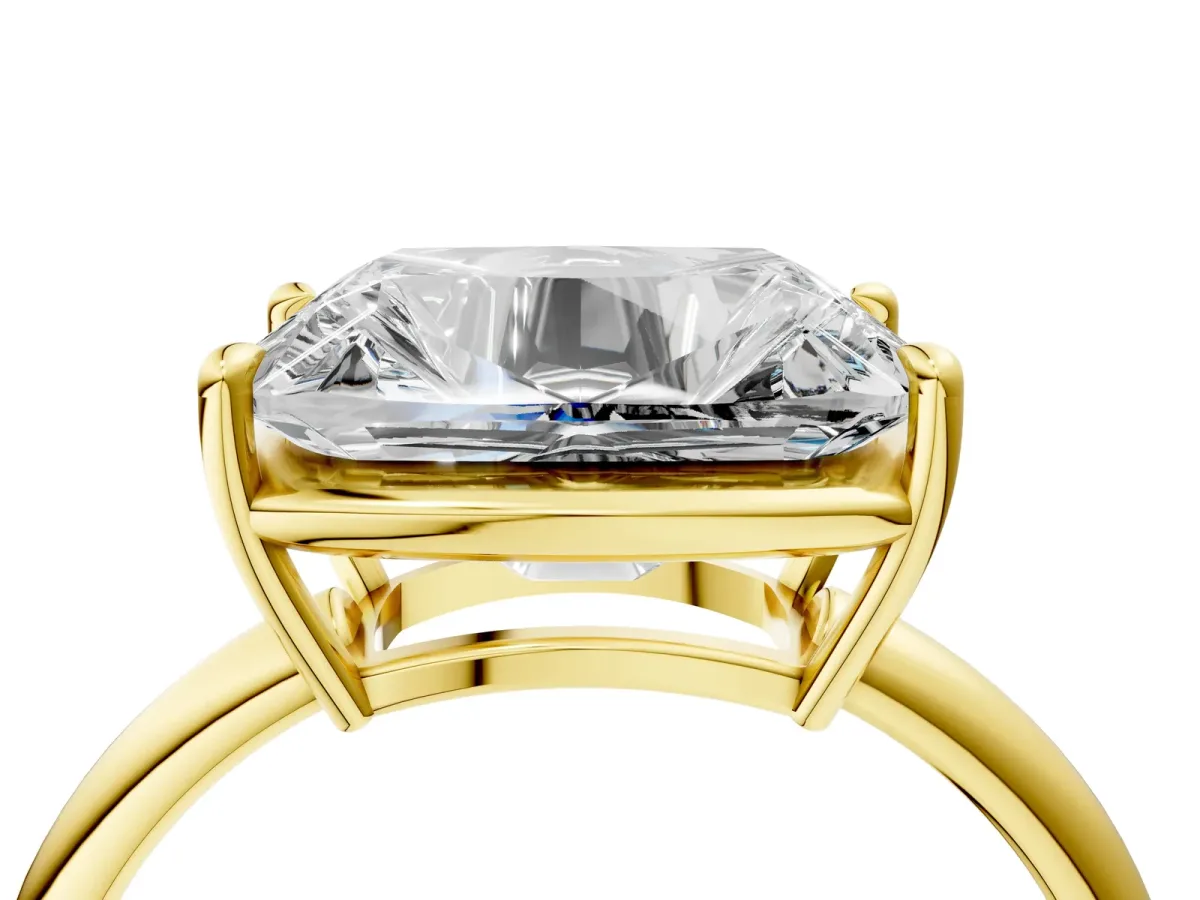 Old Mine Elongated Cushion Diamond East-West Bezel Set Four Claw Solitaire Ring Yellow gold