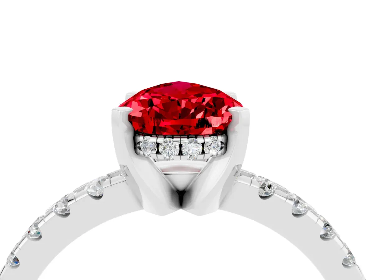 Pear Cut Ruby Solitaire Ring with Round Pavé Band and Four-Prong Setting White gold