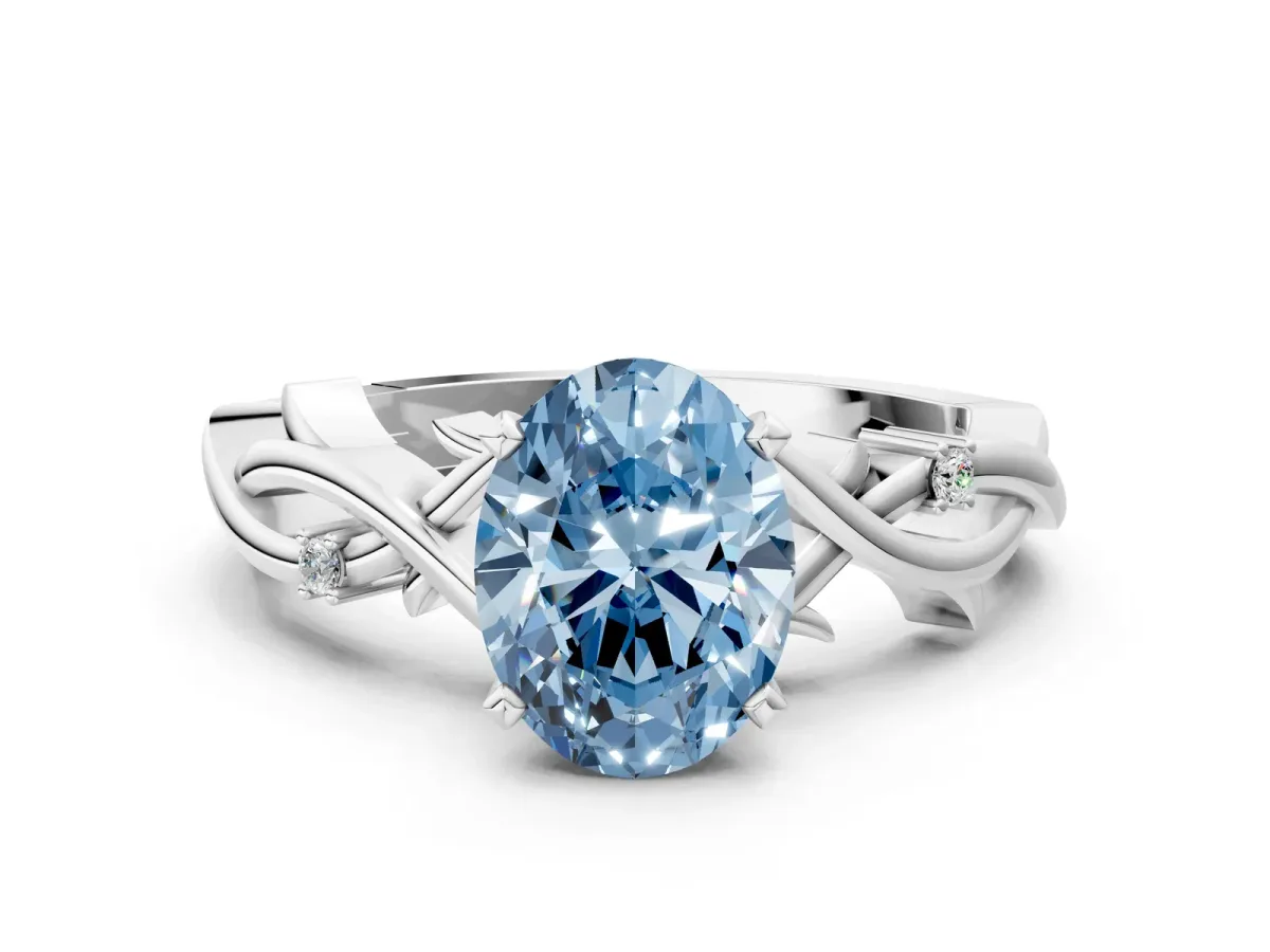 Fancy Blue Oval Cut Diamond Solitaire Ring with Twisted Band and Prong Setting Silver