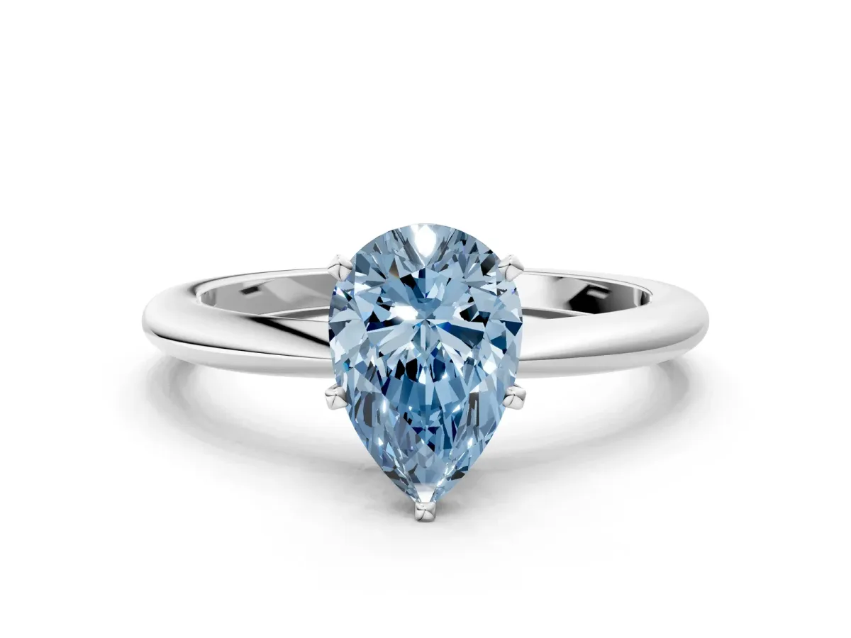Fancy Blue Pear Cut Diamond Solitaire Ring with Six-Prong Setting and Classic Band Silver
