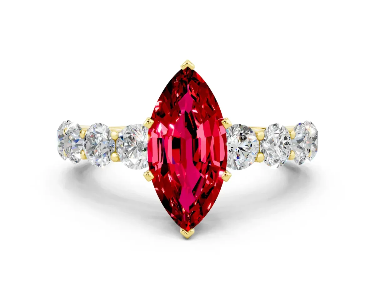 Marquise Cut Ruby Prong Setting with Side Stones on a Pave Band Yellow gold