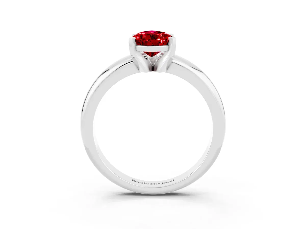 Pear Cut Ruby Solitaire Engagement Ring with Round Band and Four-Prong Setting Silver