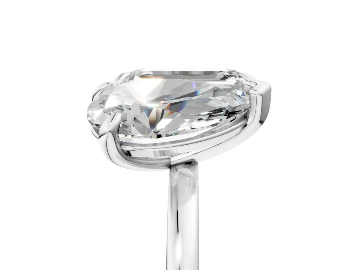 Pear and Emerald Toi Moi Ring with Prong Setting and Plain Band Silver