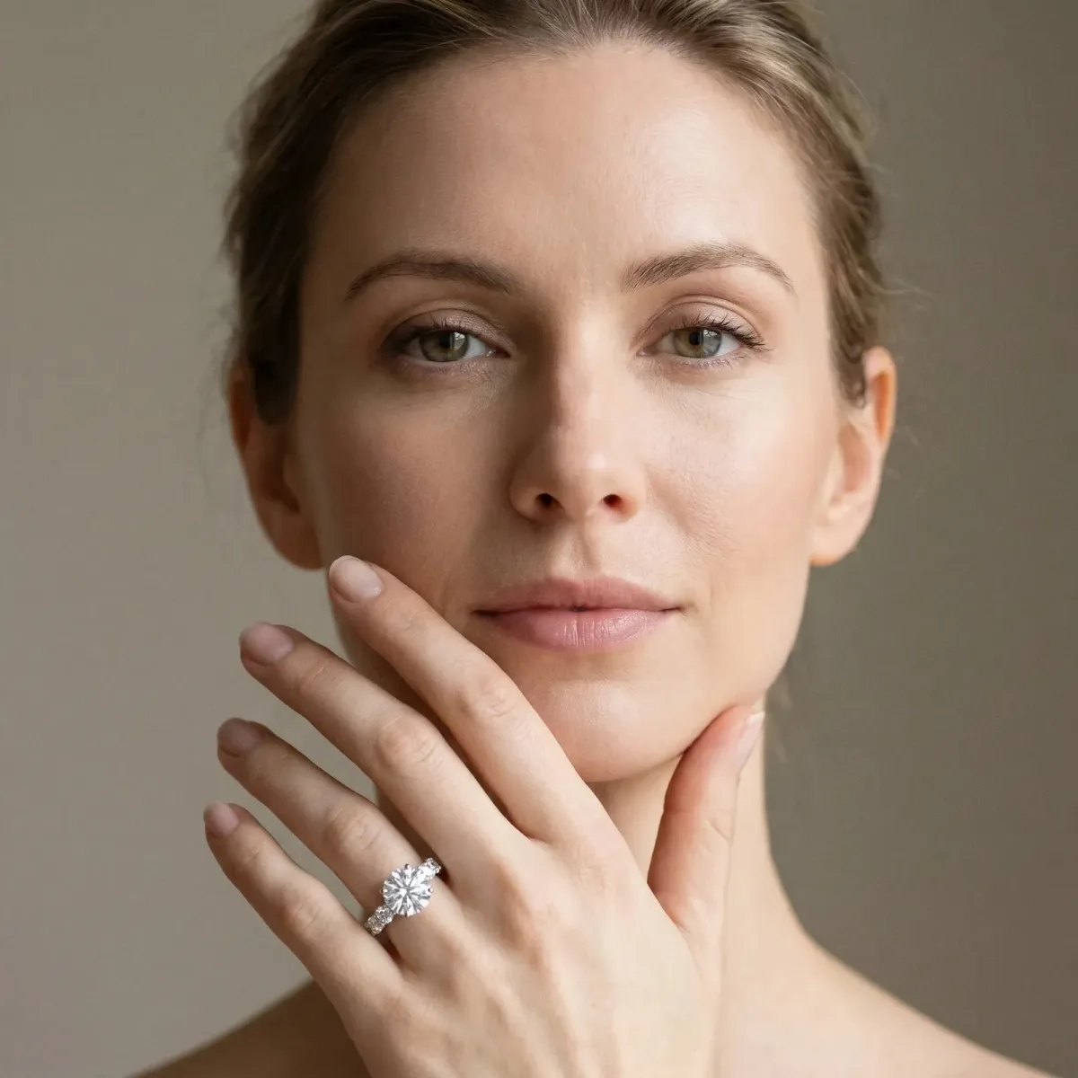 Round Cut Diamond Side Stone Engagement Ring with Four-Prong Setting Silver