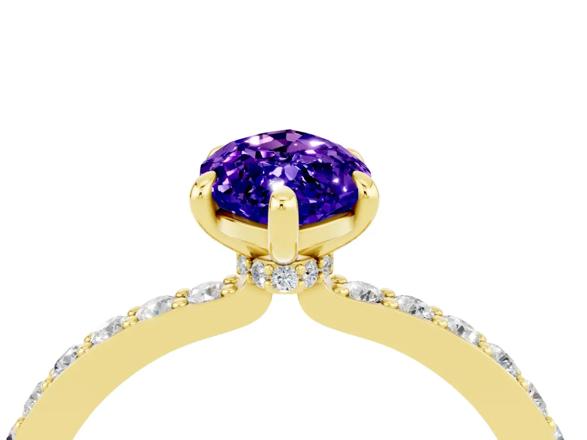 Marquise Cut Tanzanite Solitaire Engagement Ring with Pavé Band and Four-Prong Setting Yellow gold