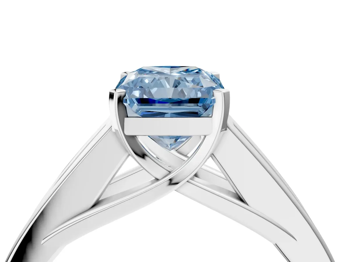 Fancy Blue Radiant Cut Cut Channel Set Solitaire Ring with Four-Prong Setting Silver