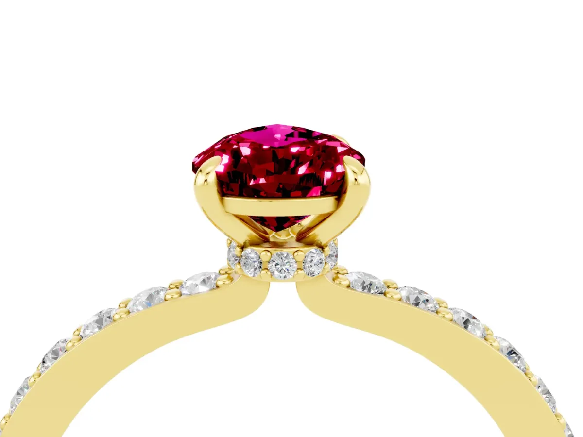 Pear Cut Garnet Solitaire Engagement Ring with Pavé Band and Four-Prong Setting Yellow gold