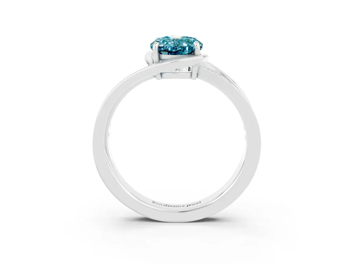 Oval Cut Blue Topaz Solitaire Ring with Split Shank and Prong Setting White gold