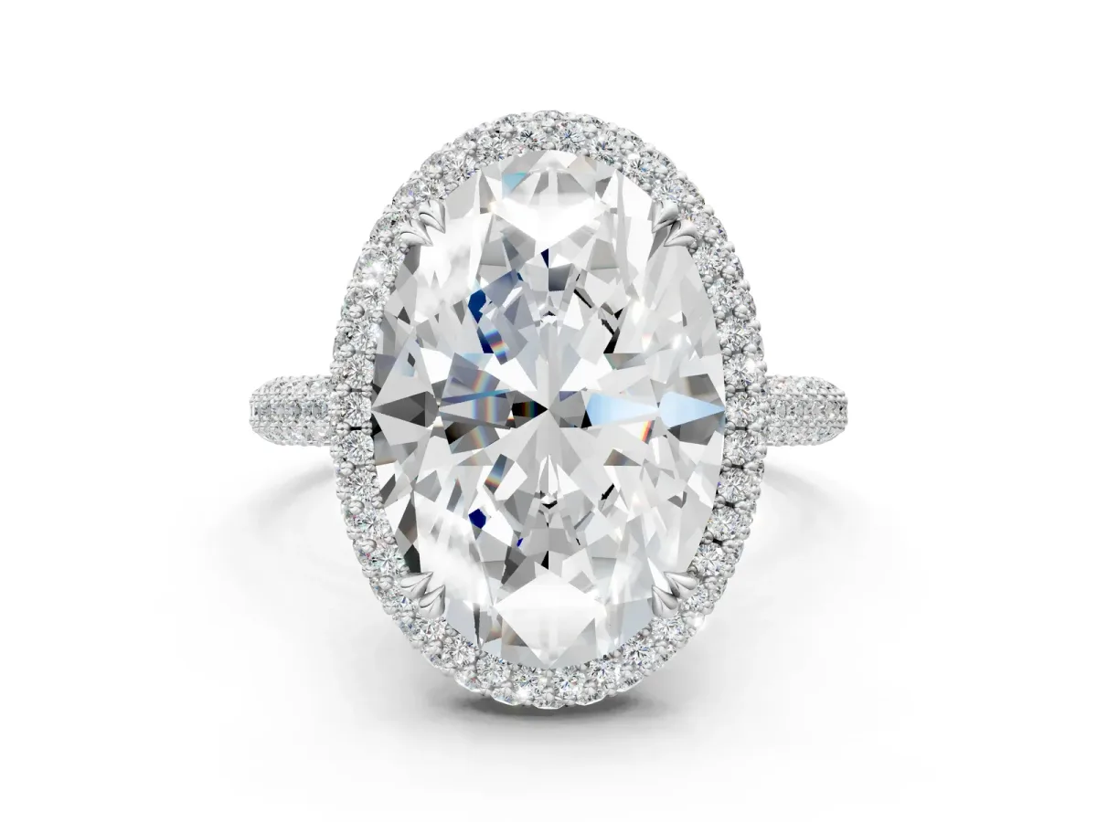 Oval Diamond Halo Ring with Round Diamond Accents Platinum